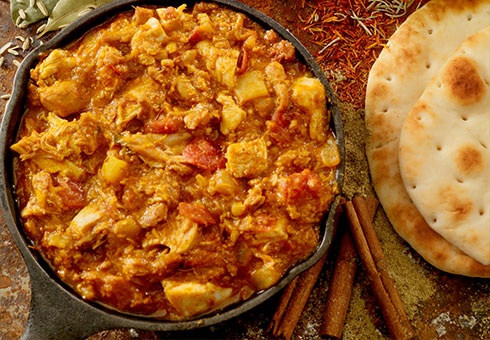 Heaton Balti Stockport richly flavoured chicken curry served with naan